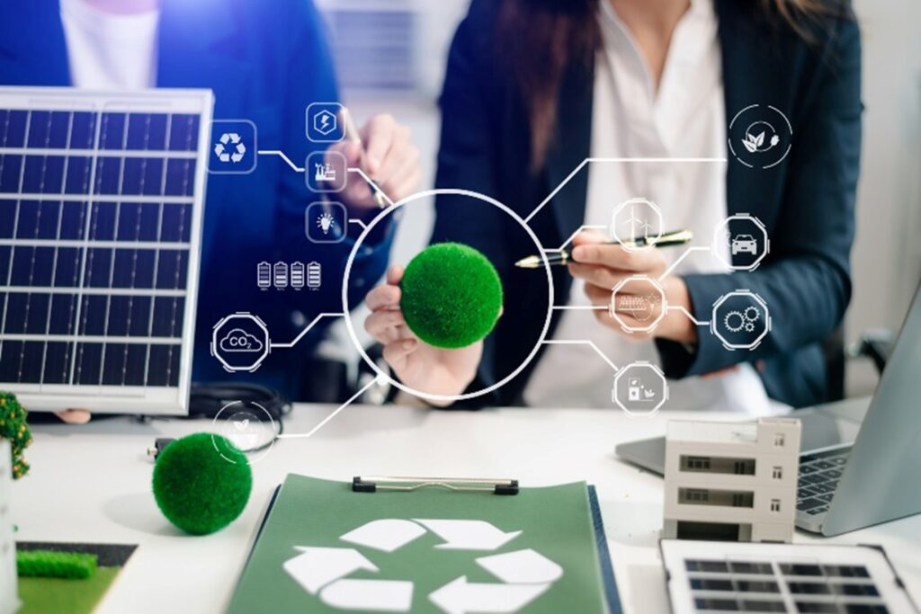 People pointing to a green ball with recycling and technology symbols around it by Okon Recycling